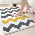 Absorbent plush bathroom mat with grey white yellow wave pattern on wooden floor - 40*60cm / Wave of Light-Yellow