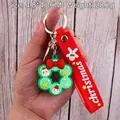 Christmas wreath keychain with Santa and snowman, red silicone strap, 4.8x4.0cm size - Christmas Wreath-4