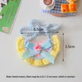 Handmade pink and yellow knit pet collar with blue bow and floral charm accessory - Yellow Scalloped Edge
