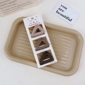 Close-up of three matte brown triangular hair clips in a stylish gift tray display - 3Pcs Claw Clip Set-Triangle Shape / Coffee Brown Series