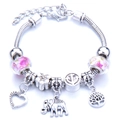 Silver Pandora style bracelet with pink floral beads and charms like elephant and anchor - Pink White