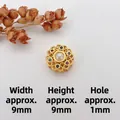 Detail of 9mm gold-plated flower charm with cat-eye stone and colorful zircons - Style 12