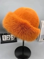 Vibrant orange faux fur winter hat with plush finish and thick warm bucket design - Orange Yellow