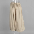 Detail view of the drawstring elastic waistband on apricot cotton lantern trousers - S / Khaki