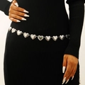 Close-up of silver metal waist chain with hollow heart patterns on a black dress - Heart Embossed Style (M-271)