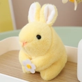Cute yellow plush bunny with white flower detail and soft short-fleece texture - Yellow Rabbit 12cm