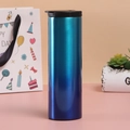 Blue gradient stainless steel vacuum coffee mug with a black flip lid in a stylish setting - 500ml / Gradient Blue