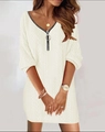 Close-up of cream knit dress with V-neckline and silver metal zipper detailing - S / Top And Bottom / Beige