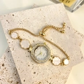 Elegante orologio a bracciale dorato con lunetta in strass e intarsio in madreperla - Fiore Dorato