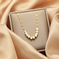 Golden water ripple necklace with seven cube charms displayed on champagne silk fabric - 14# Xl1900-5 All-titanium Steel Necklace With A Few Taels Of Broken Silver