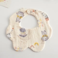 Cotton gauze baby bib with petal shape and cute gray bear patterns in off-white - Gauze Flower Wrap - Cosmic Grizzly