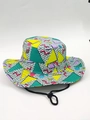 Detail of colorful geometric print sun hat with adjustable black chin strap and vent holes - Yellow Green Geometric