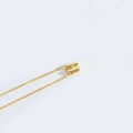 Minimalist gold clavicle necklace featuring a hollow letter H pendant on a fine link chain - Letter H