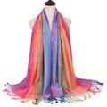Detailed view of the ethnic floral jacquard pattern and soft fringe on the pashmina shawl - Floral Pink