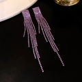 Macro shot of long purple tassel earrings with sparkling rhinestones on dark background - Black-Purple-Square