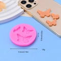 Detailed pink silicone butterfly mold with dimensions 5.5cm for DIY cake fondant and resin - Triple Butterfly Design(7)