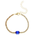 Golden bracelet featuring a large square blue gemstone and champagne zircon pave chain - Tennis Chain Style / Gold + Royal Blue Zirconia