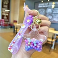 Detailed macro view of acrylic star keychain with colorful beads and purple wrist strap - Purple Colorful Bead Pentagram