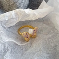 Elegant gold butterfly ring with lavender enamel wings and white pearl center inlay - Lavender Enamel Butterfly Pearl Ring(NL00760R-PP)