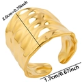 Detailed view of golden irregular hammered ring showing width of 1.7cm and mirror texture - Gold