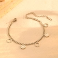 Detailed close-up of a silver stainless steel bracelet with roman numeral round charms - White Shell Round Steel Bracelet (T108)