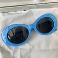Y2K style retro oval sunglasses with thick sky blue frame and dark black lenses - Round Blue Frame Black Lens Y2K