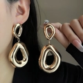 Minimalist gold hollow teardrop earrings with a high-polish metallic finish for women - E5565-2 Hollow Teardrop