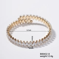 Detail view of a gold diamond-shaped bracelet with dimensions 5.1cm by 0.8cm for women - Gold Base with Clear Gem (B00432-8)