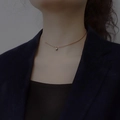 Elegant rose gold bead necklace with a polished circular pendant on a female model - Plated Rose Gold Lucky Bead Necklace