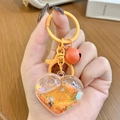 DIY cat paw keychain with vibrant orange heart liquid sand sequins and matching hardware - Orange Heart Sparkle
