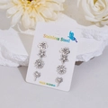 Detalle de 4 pares de pendientes de acero plateado con diseños de flores y dientes de león - Juego de 4 Pares / Color Acero