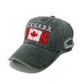 Detail of embroidered Canada logo and maple leaf flag on washed vintage baseball cap - Army Green