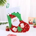 Calza di Natale con motivo Babbo Natale e pois rossi su tessuto in feltro verde - Babbo Natale