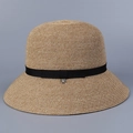 Detailed macro view of woven plant fiber texture with black grosgrain ribbon and metal charm - M (56-58cm) / Black