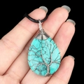 Handmade silver wire tree of life turquoise teardrop pendant on black cord - Green Turquoise (Synthetic)
