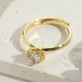 Luxurious 14K gold plated ring with round cubic zirconia and adjustable open band design - Round / Adjustable / 14K Gold Plated Round Zircon