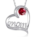 Silver heart necklace with red gemstone and MOM lettering on a reflective surface - Red Zirconia