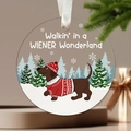 Acrylic Christmas ornament featuring a dachshund in a winter wonderland scene with ribbon - Dachshund Winter Wonderland V2