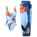 Dreiteiliges hellblaues Bikini-Set mit tropischem Lilienprint und passendem langen Wickelrock - S / Oberteil Und Unterteil / Blume auf Stein Blau