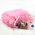 Semi-transparent pink organza drawstring gift bag with colorful beads inside for jewelry - Pink / 11x16cm