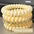 Elastic spiral hair ties set in assorted yellow tones and mango patterns for women - 4# Yellow 4-Piece Set
