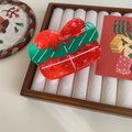 Christmas gift box hair claw clip in festive red and green with a bow design - Christmas Gift (8.4cm x 5cm)