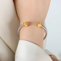 Silver twisted cable cuff bracelet with gold accents and pink zircon stones - Z059-Pink Zirconia Single Layer