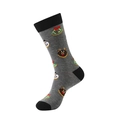Close-up of knit Christmas crew socks featuring reindeer and snowman patterns on grey fabric - Grey Christmas (A857)