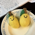 Handmade wool felt pear keychains in yellow and green with cute smiley faces - Lemon