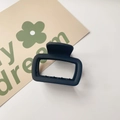 Detailed top view of a stylish black square hair claw clip on a white background - Matte Small Square Black