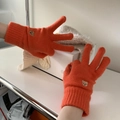 Orange knitted gloves with bear embroidery featuring touch screen friendly material - Orange
