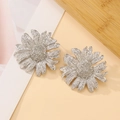 Detailed close-up of silver sunflower earrings featuring realistic brushed metal texture - Silver Daisy Stud Earrings (9564)