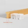 Protezione angolare a T dorata spazzolata, larghezza interna 7-8mm con clip trasparenti - Piccolo Angolo GT Traslucido