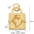Miniature gold-plated copper bag padlock charm with crown and heart embossed details - Crown Heart Book Charm / Gold